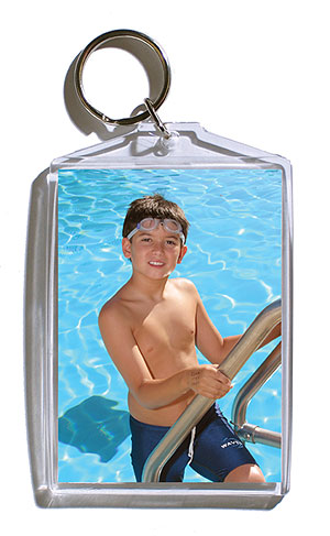 Keychain - 3x4 inch keychain that holds two wallet photos of your player.