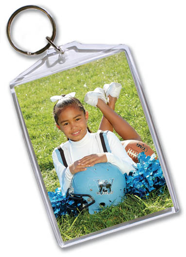 Keychain - 3x4 inch keychain that holds two wallet photos of your player.