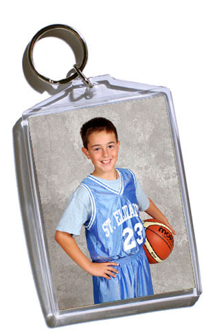 Keychain - 3x4 inch keychain that holds two wallet photos of your player.